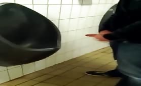 Friend filming me jerking off in public toilet.