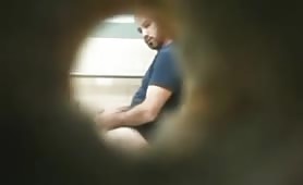 Spying on a hot daddy jerking off in the toilet