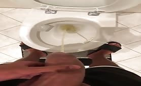 Nigga in shorts masturbating and shooting his load  in the pot