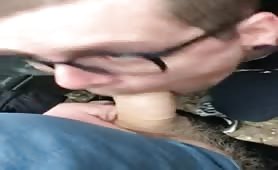 Cocksucker blowing two cocks outside in parking lot