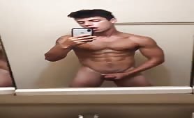 Cute young muscular guy shows his delicious hung cock