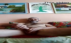 Horny old man with a huge cock masturbates in front of the webcam