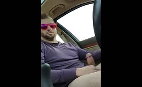 Cute guy with sunglasses  jerk off in his car