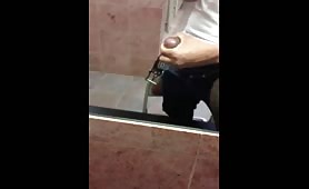 Hot dominican guy masturbating in a public toilet