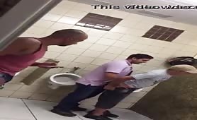 Fucking in a public bathroom in front of everyone