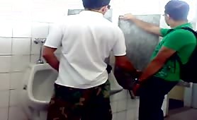 Giving a handjob a stranger in a train station bathroom