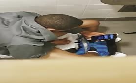 Spying on a guy in the public toilet while he masturbates