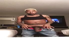 Freaky big cock nigga stroking his cock in front of a web cam