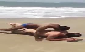 European tourist is fucked on the beach by two young guys