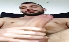 Sexy stud stroking and shooting a mega cumshot