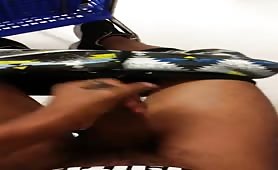 Horny black guy strokes his fat cock in the market