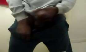Nigga wanking his cock in a toilet solo