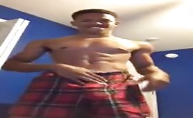 Handsome young guy doing a solo in front of the web cam