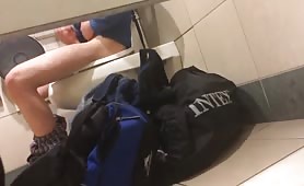 Spying a horny guy masturbating in a toilet