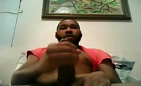 Horny black dad rubbing his cock in front of the web cam