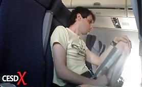 Horny guy rubbing his cock in a commercial airplane