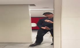 Horny young dude having a huge orgasm in a public toilet