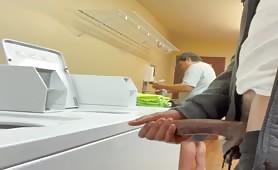 Rubbing my cock in front of my neighbor in the laundry room