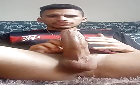 Beautiful Latino stud masturbates in front of the webcam