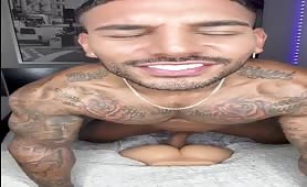 Handsome muscular tattooed latino pounding an ass toy