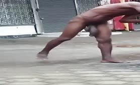 Exhibitionist bum walks and masturbates naked down the street