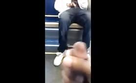 Two young black guys masturbate in a subway car