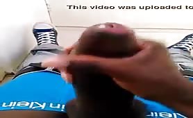 African dude jerks off his huge black cock