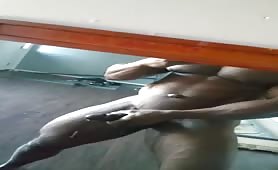 Huge muscular black spits out a huge load of cum before going to the gym