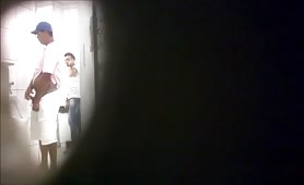 teen spies on men in the public bathroom