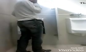 Horny black latino masturbates in public toilets