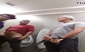 Two gay gentlemen do cruising in the bathrooms