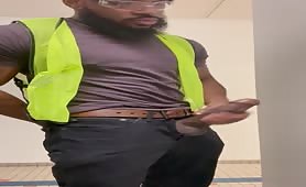 Bearded black construction worker rubbing his cock during work hours